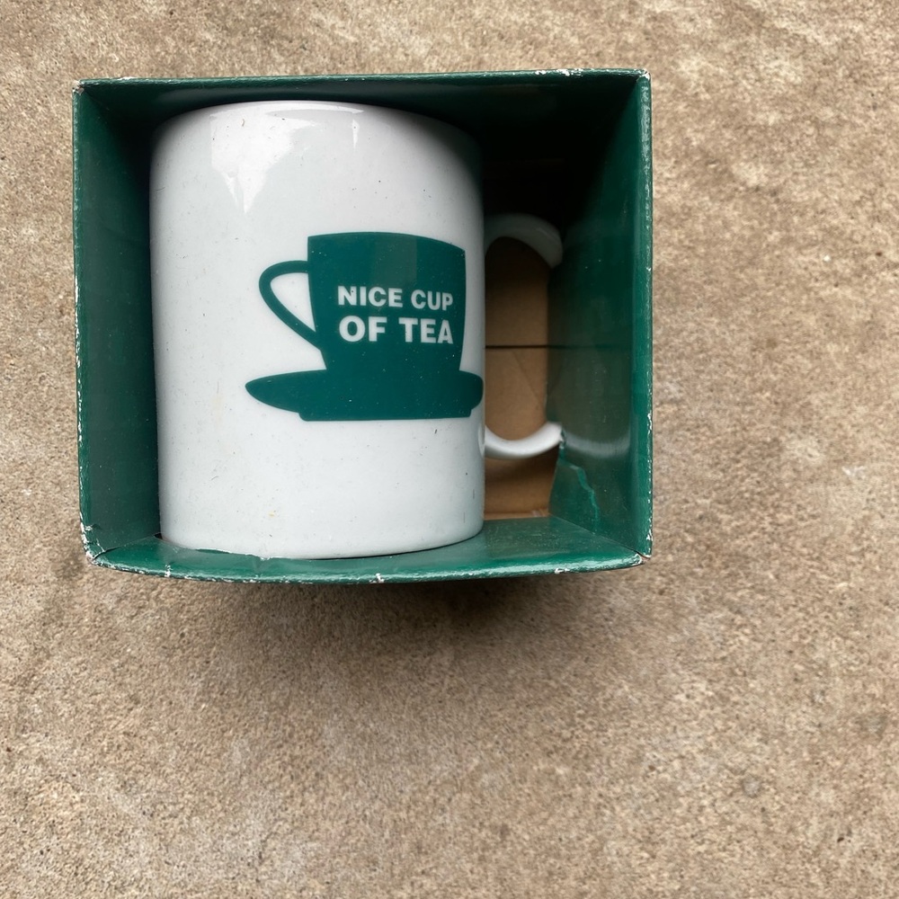 White Mug with Green Tea Cup Design